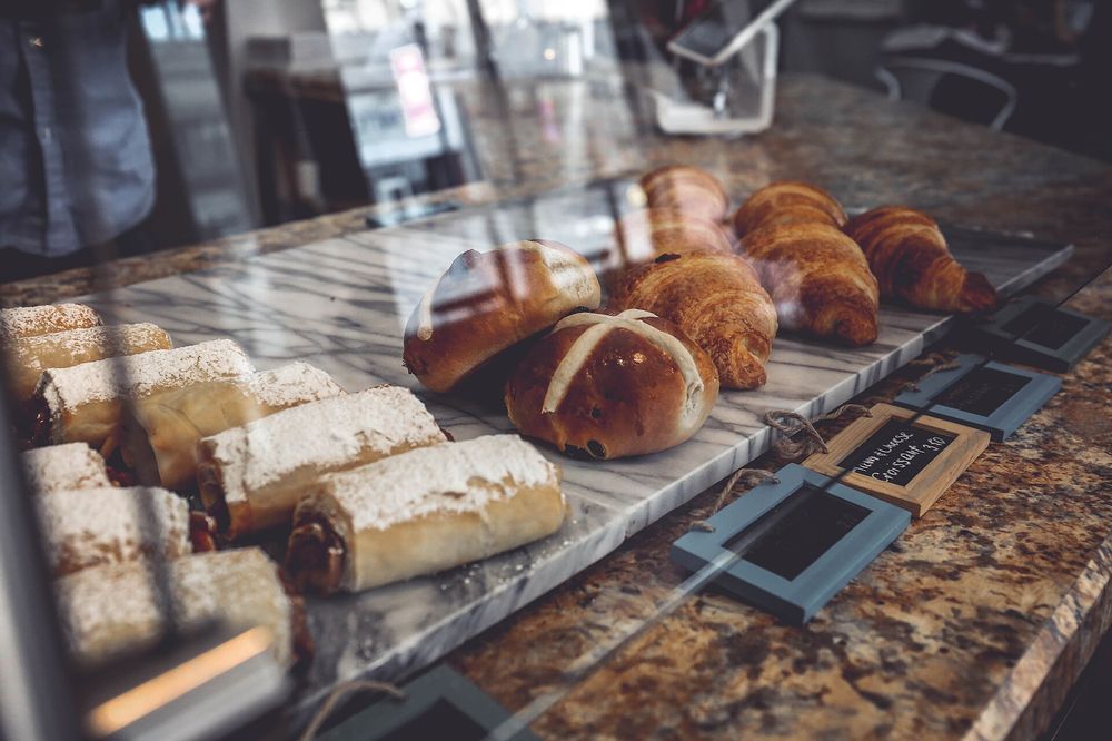 Fresh pastries in a bakery display case